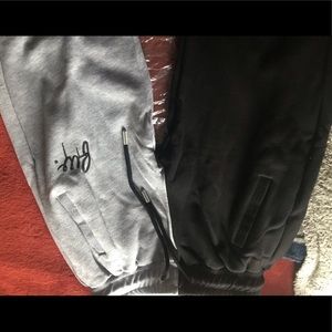 Black and gray filthy wealth jogging pants.